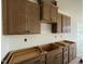 Close up view of custom kitchen cabinets adding storage and style to the kitchen at 89 Willow Cameron Way, Angier, NC 27501