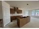 Well designed kitchen with undermount sink cabinet and island at 89 Willow Cameron Way, Angier, NC 27501