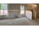 New construction showing drywall and staircase ready for personalization with natural light from windows at 89 Willow Cameron Way, Angier, NC 27501