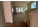 Unfurnished living room featuring large windows, natural light, and an open floor plan at 89 Willow Cameron Way, Angier, NC 27501