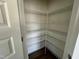 Walk-in pantry with wire shelving providing ample storage space for food and kitchen supplies at 89 Willow Cameron Way, Angier, NC 27501