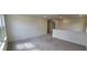 Carpeted living room with recessed lighting and an open layout to the rest of the home at 937 Emmer St, Rolesville, NC 27571