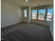 Bedroom featuring plush carpeting, natural light, and neutral walls at 98 Willow Cameron Way, Angier, NC 27501