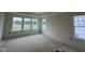 Spacious bedroom featuring large windows, allowing plenty of natural light at 98 Willow Cameron Way, Angier, NC 27501