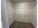 Walk-in closet featuring wire shelving for organized storage of clothing items at 98 Willow Cameron Way, Angier, NC 27501