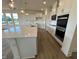 Well-equipped kitchen with stainless steel appliances, ample cabinet space and a center island at 98 Willow Cameron Way, Angier, NC 27501