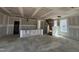 Open living space featuring a staircase, under construction at 98 Willow Cameron Way, Angier, NC 27501