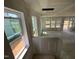 A view of a spacious open-concept living room from the staircase, under construction at 98 Willow Cameron Way, Angier, NC 27501