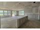 Bright, open-concept room featuring many windows, under construction at 98 Willow Cameron Way, Angier, NC 27501