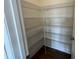 Walk-in pantry featuring wire shelving for organized storage of food items at 98 Willow Cameron Way, Angier, NC 27501