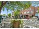 Charming brick building with benches and greenery in the downtown area at 98 Willow Cameron Way, Angier, NC 27501