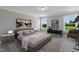 Comfortable main bedroom with neutral tones, plenty of light, and stylish decor at 53 Merele Dr, Wendell, NC 27591