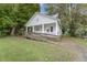 Charming home featuring a front porch with a ramp for easy access at 1001 E Morehead St, Burlington, NC 27215