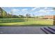 Lush backyard features a large fenced-in green space ideal for recreation and relaxation, with a gazebo at 1018 Terrell Woods Ln, Chapel Hill, NC 27516