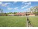 A well-maintained barn sits on a sprawling, grassy property at 1018 Terrell Woods Ln, Chapel Hill, NC 27516