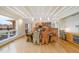 Bright dining area showcases a wooden table, decorative chairs, and seamlessly connects to the modern kitchen at 1018 Terrell Woods Ln, Chapel Hill, NC 27516
