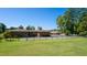 Well-manicured horse farm with fenced paddocks, lush pastures, and mature trees at 1018 Terrell Woods Ln, Chapel Hill, NC 27516