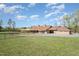 Charming horse barn and outbuildings on expansive property with green grass at 1018 Terrell Woods Ln, Chapel Hill, NC 27516
