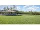 A vast green field with a gazebo and fencing at 1018 Terrell Woods Ln, Chapel Hill, NC 27516