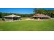 Extensive horse barn includes a round pen, paddocks, and fenced pasture land at 1018 Terrell Woods Ln, Chapel Hill, NC 27516