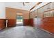 Wood paneled horse stall with dutch door leading out to an enclosed pasture at 1018 Terrell Woods Ln, Chapel Hill, NC 27516