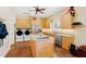 Bright and modern kitchen with stainless steel appliances, granite countertops, and ample cabinet space at 1018 Terrell Woods Ln, Chapel Hill, NC 27516