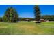 Picturesque view of the property with well-maintained horse facilities and lush green pastures at 1018 Terrell Woods Ln, Chapel Hill, NC 27516