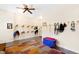 Spacious tack room featuring multiple saddle and bridle racks and tile flooring for easy maintenance at 1018 Terrell Woods Ln, Chapel Hill, NC 27516