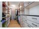 Spacious walk-in closet with custom shelving and ample storage space at 1018 Terrell Woods Ln, Chapel Hill, NC 27516