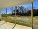 View of the back yard from covered porch at 111 Magnolia Run Way, Benson, NC 27504