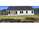 Exterior of home with white siding and a dark roof at 111 Magnolia Run Way, Benson, NC 27504