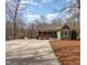 Charming exterior view of a craftsman home with a large concrete driveway at 111 Preakness Dr, Archer Lodge, NC 27527