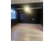 An empty room has a ceiling fan, light walls, and light flooring creating a blank canvas for any style at 1204 Avondale Dr, Burlington, NC 27217