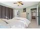 Bright bedroom featuring an ensuite bathroom at 1414 Mahonia Ct, Raleigh, NC 27615