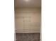 Walk-in closet with an adjustable wire shelving system, providing customizable storage space at 1414 Reading Ct # 91Kl, Burlington, NC 27217