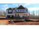 Charming two-story new construction home with covered front porch and an attached two car garage at 1414 Reading Ct # 91Kl, Burlington, NC 27217