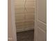 Walk-in pantry providing ample storage space with multiple shelves for organized kitchen supplies at 1414 Reading Ct # 91Kl, Burlington, NC 27217