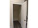 Hall storage space or small room with hardwood floors and neutral paint at 1414 Reading Ct # 91Kl, Burlington, NC 27217