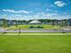 Community green space with manicured landscaping and a gazebo at 15 Nimble Way # 175, Clayton, NC 27520