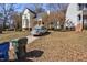 Charming two-story home with a front yard and driveway at 1721 Kingston Heath Way, Raleigh, NC 27604