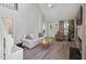 Bright living room featuring hardwood floors and lots of comfortable seating at 1721 Kingston Heath Way, Raleigh, NC 27604