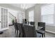 Chic dining room featuring chandelier and doorway that provides great lighting to the foyer at 213 W Weatherford Dr, Angier, NC 27501
