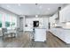 Modern kitchen with an island, stainless appliances, and ample cabinet space at 213 W Weatherford Dr, Angier, NC 27501