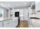 Bright kitchen with a center island and stainless steel appliances at 213 W Weatherford Dr, Angier, NC 27501