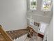 Aerial view of a staircase featuring a chandelier and large windows at 213 W Weatherford Dr, Angier, NC 27501
