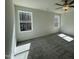 Bright and airy bedroom with natural light, neutral carpet and large windows with backyard view at 223 Magnolia Run Way, Benson, NC 27504