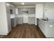 Modern kitchen featuring gray cabinets, granite countertops and stainless steel appliances at 223 Magnolia Run Way, Benson, NC 27504