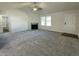 Spacious living room with a fireplace and an open floor plan, perfect for entertaining at 223 Magnolia Run Way, Benson, NC 27504