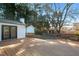 Large back deck overlooking the yard with white shed at 226 Pinecroft Dr, Raleigh, NC 27609