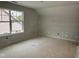 Bedroom showing spacious layout with a window at 235 Meadowbark Bnd # 26, Garner, NC 27529